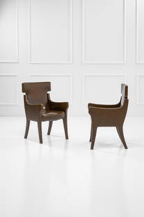 Ignazio Gardella, Due poltrone mod. R63: Due poltrone mod. R63 Struttura in legno imbottita e completamente rivestita in skai. Prod. Azucena, 1963 ca. cm 90x56x56