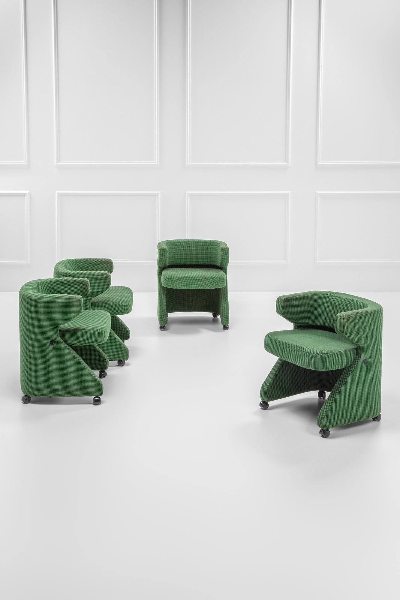 Gianni Moscatelli, Quattro poltrone mod. New Poney: Quattro poltrone mod. New Poney Struttura interamente rivestita, quattro ruote piroettanti. Prod. Formanova, 1997 ca. cm 67x58x52 LITERATURE: Domus, n. 797, ottobre 1997, p. 160.