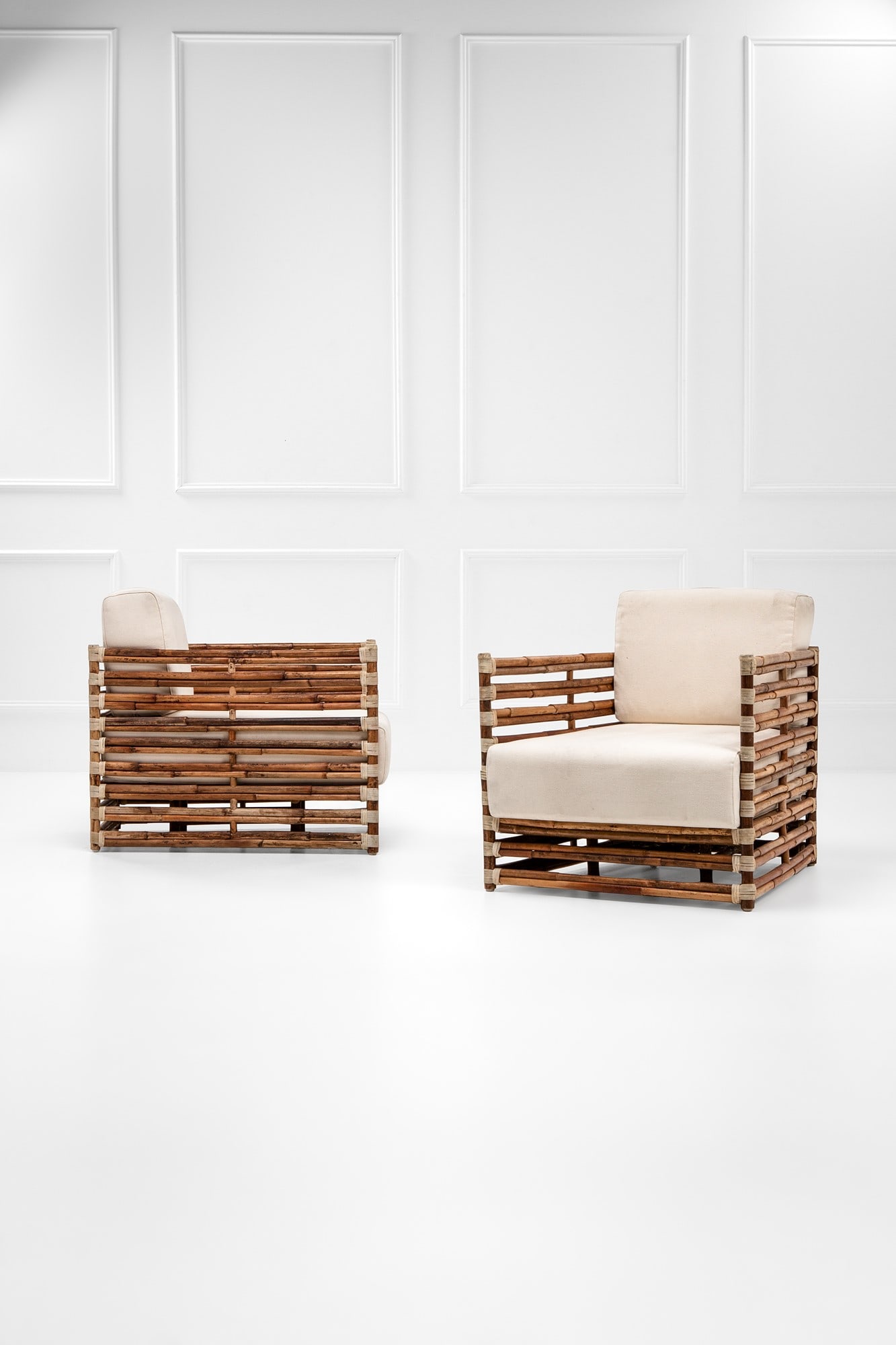 Paola Navone. Due poltrone della Collezione Malaka: Due poltrone della Collezione Malaka Canna d'India, pergamena, tessuto. Prod. Gervasoni, 2001 ca. Conferma scritta di Giovanni Gervasoni. cm 79x75x82