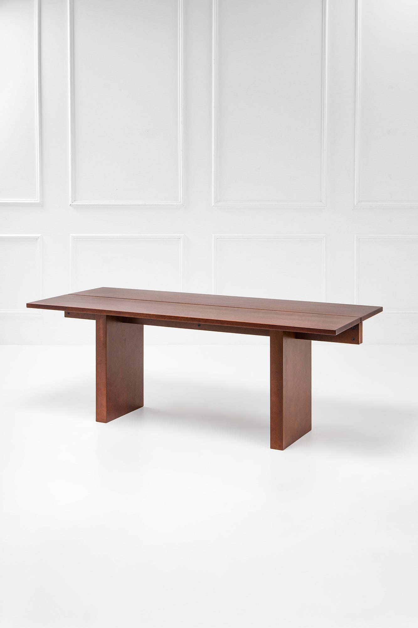 Superstudio. Tavolo mod. Lambda: Tavolo mod. Lambda Legno tinto. Prod. Giovannetti, 1970 ca. cm 74x85x200 Literature: G. Pettena, Cristiano Toraldo di Francia. Progetti e architetture 1980-1988, Electa, Milano, 1988, p. 198.