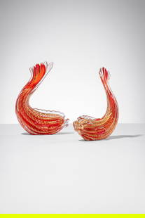 Ercole Barovier. Due pesci della serie Cordonato Oro: Due pesci della serie Cordonato Oro Vetro soffiato rosso decorato con cordoni oro. Barovier & Toso, 1949-50 ca. cm 27x21x10 Literature: Attilia Dorigato (a cura di), Ercole Barovier, 1889-1974. Vetrai