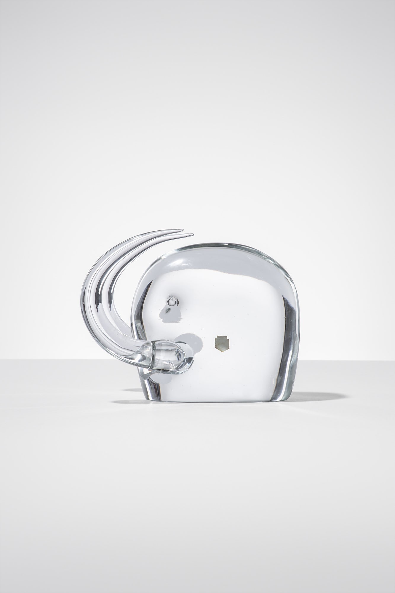 Antonio Da Ros. Mammuth: Mammuth Vetro massiccio cristallo. Gino Cenedese & Figlio, 1964 Etichetta Murano Cenedese Vetri. Etichetta Cenedese Glass Murano 90/64. cm 18x21x14 Literature: Cristina Beltrami e Giordana Naccari (a