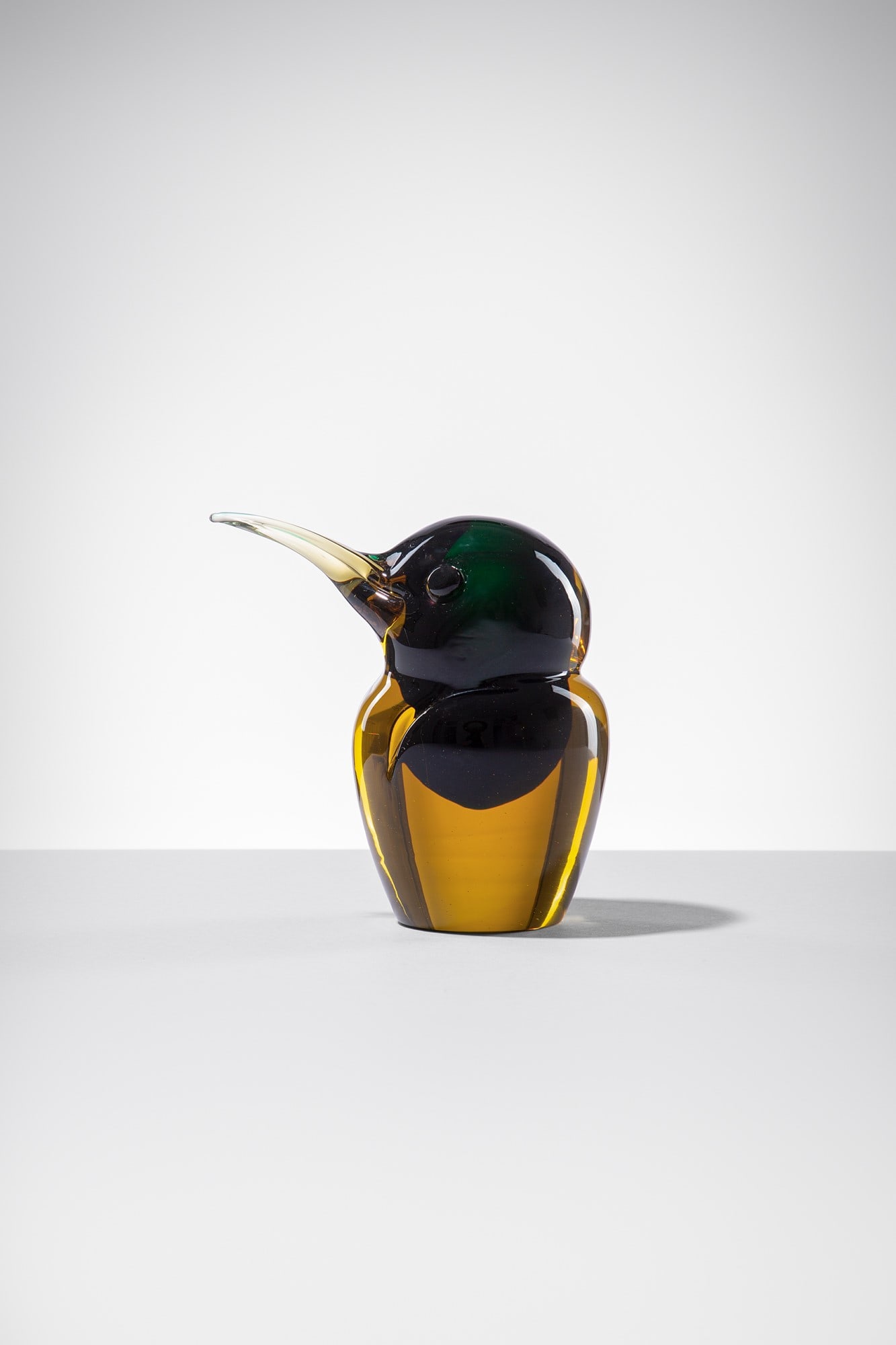 Antonio Da Ros. Uccellino: Uccellino Vetro massiccio sommerso cristallo e ambra. Gino Cenedese & Figlio, 1960 ca. cm 14x9x15 Literature: Rosa Chiesa, Silvia Ciappi, Sandro Pezzoli (a cura di), Gli animali di Murano. Opere in ve