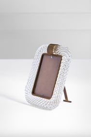 A curated selection of 20th-century furniture and lighting, defined by exceptional charm and elegance, and distinguished by a richly decorative character designed to enhance refined interiors.