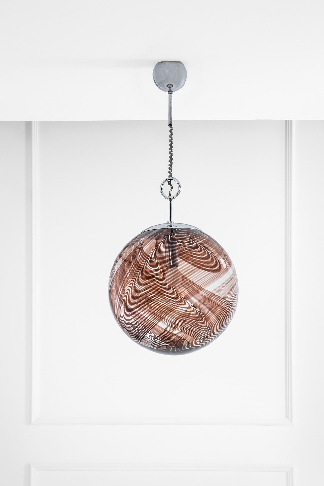 Lino Tagliapietra. Lampada a sospensione: Lampada a sospensione Vetro soffiato cristallo e canne ruggine, metallo cromato. Prod. La Murrina, 1960 ca. h cm 97, diam. cm 45