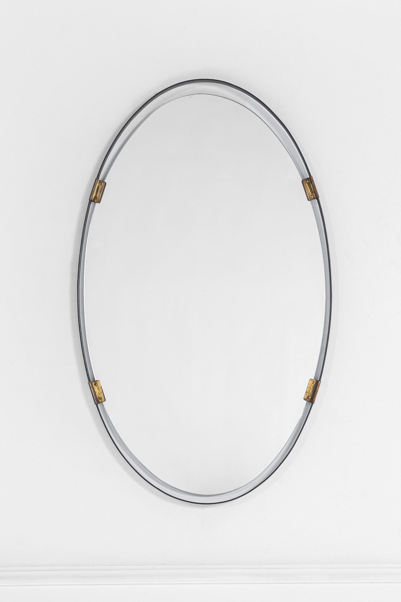 Santambrogio e De Berti (attr.). Specchiera: SpecchieraVetro specchiato, ottone, ferro.1960 ca.cm 94x56x3