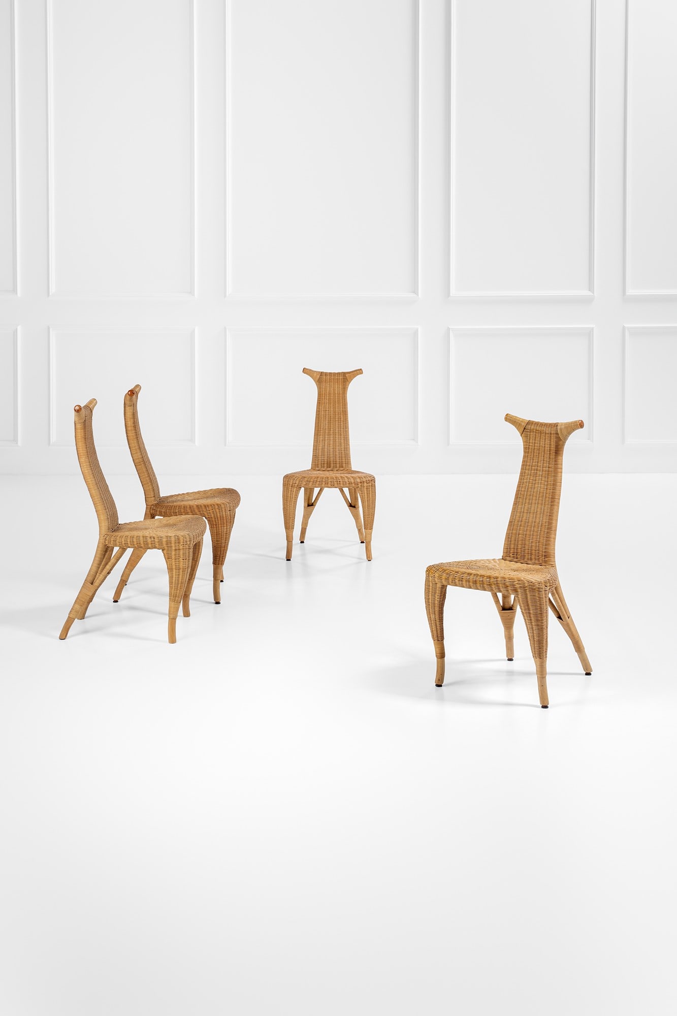 Marco Agnoli. Quattro sedie mod. Carmen: Quattro sedie mod. Carmen Bamboo, canna d'India. Prod. Bonacina, 1980 ca. cm 96x48x55 BIBLIOGRAFIA: Catalogo Bonacina.