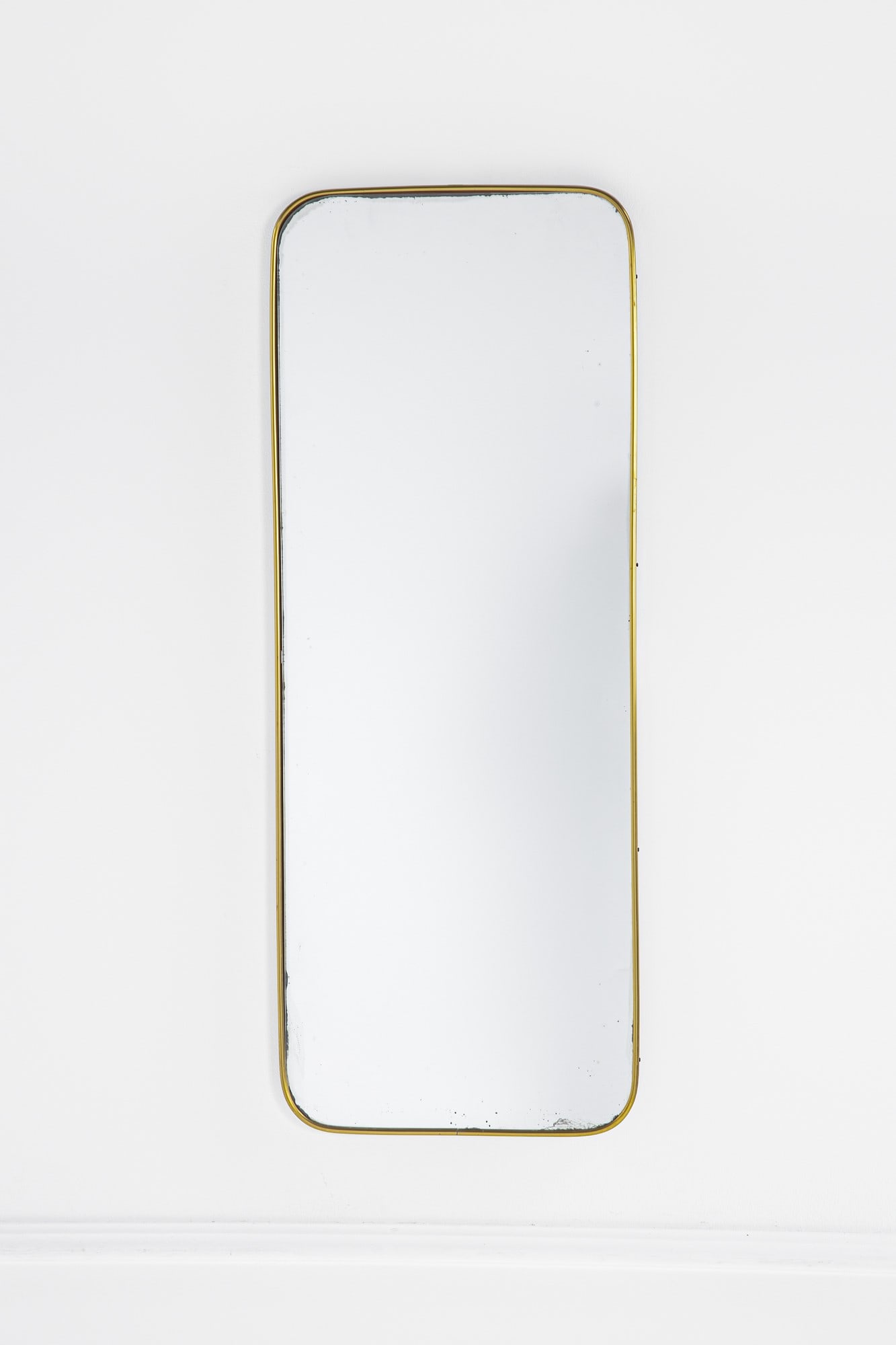 Specchio da parete: Specchio da parete Ottone, vetro specchiato. 1950 ca. cm 101x38x3