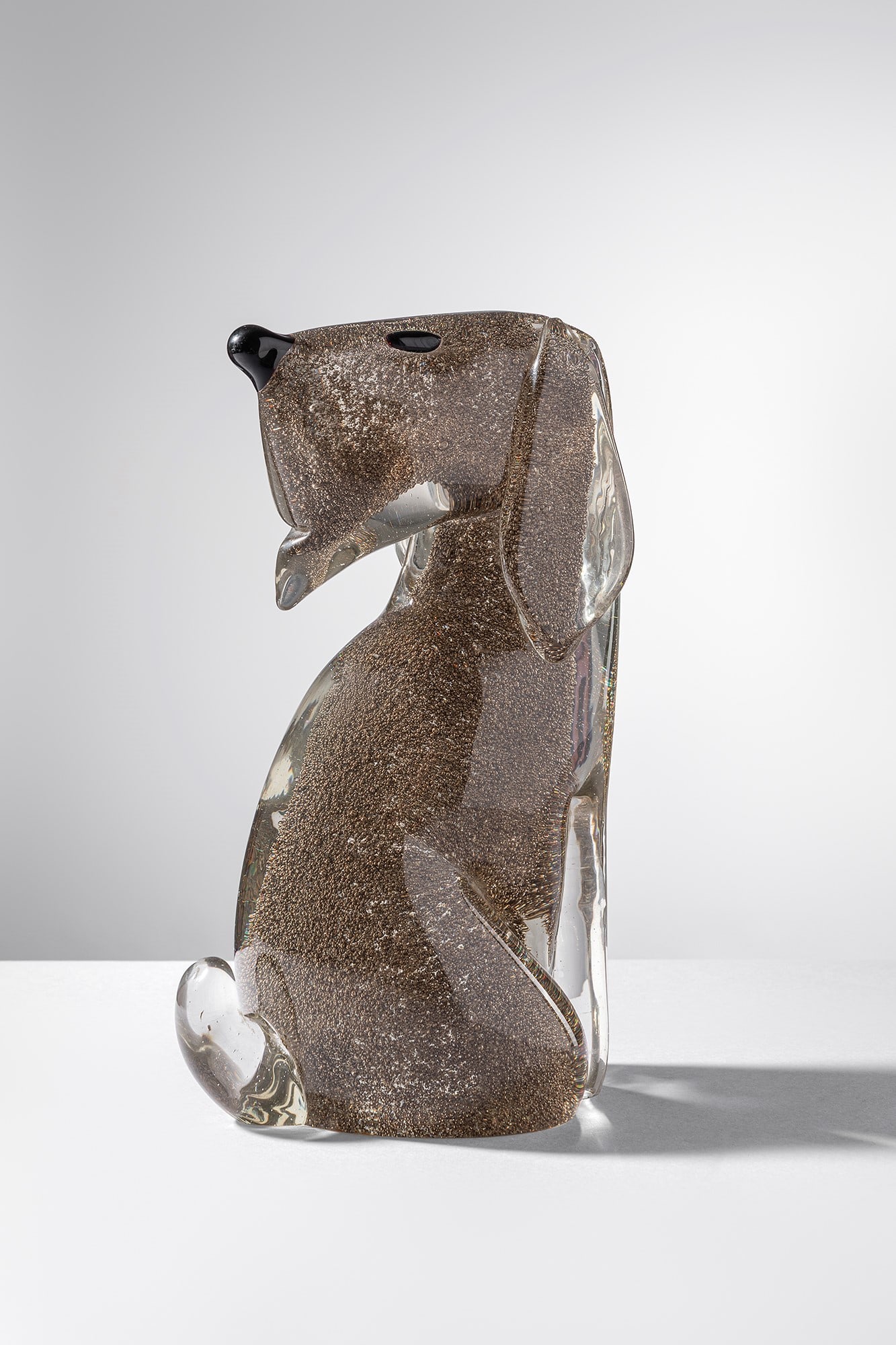 Archimede Seguso. Cane: Cane Vetro sommerso lavorato a bollicine. Archimede Seguso Murano, 1940 ca. cm 22x12x10
