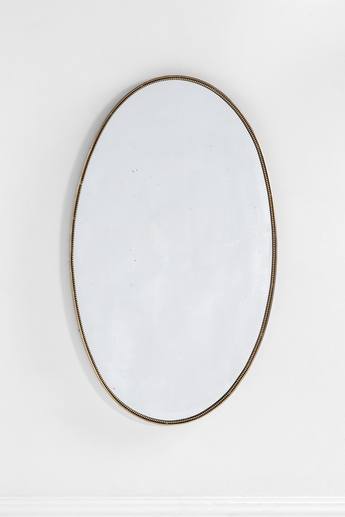 Specchio da parete: Specchio da parete Ottone, vetro specchiato. 1950 ca. cm 67x40x3