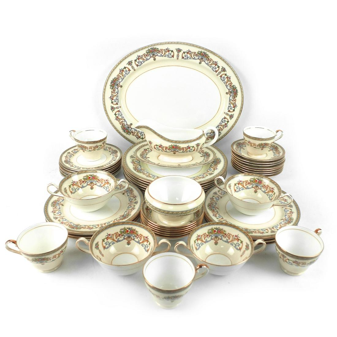Aynsley Dinner Service: Forty Nine (49) Piece Aynsley "Henley" Porcelain Dinner Service. Includes: (6) dinner plates measuring 10-1/2", (8) desert plates measuring 8-3/8", (7) bread and butter plates, (5) footed cups, (4) cr