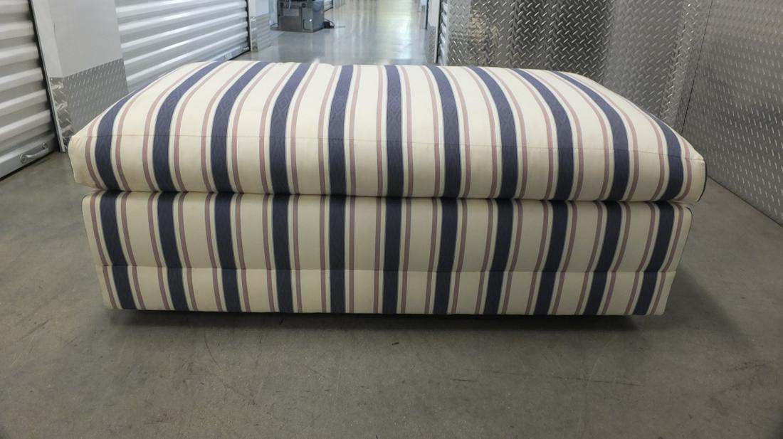 Rectangular Bench: Large Modern Upholstered Rectangular Bench on Casters. Measures 19" x 50" x 27". Condition: Spotting and small wear to an area, needs cleaning otherwise good condition. Estimate $20.00 - $60.00 Domest
