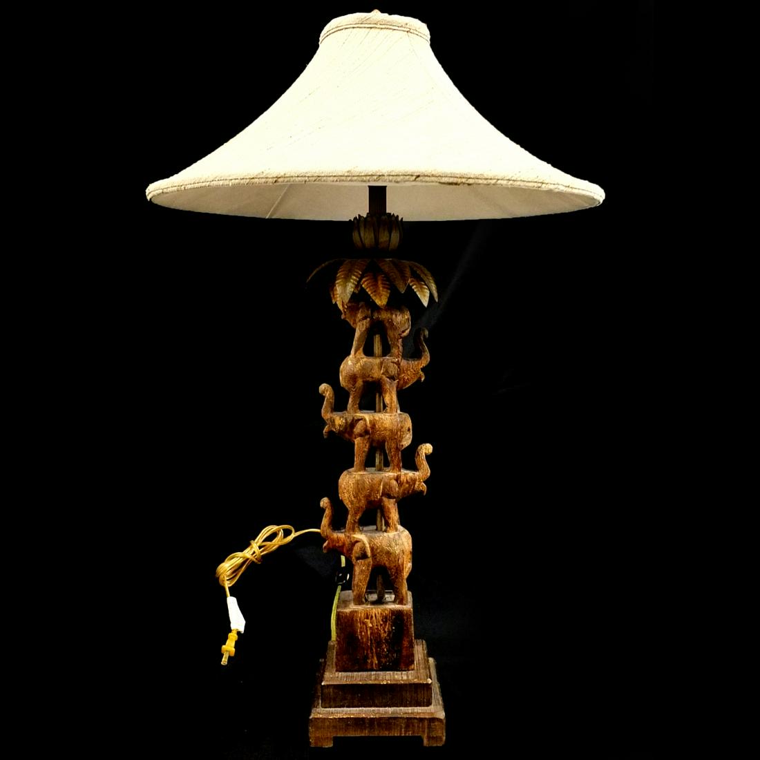 Tyndale Lamp Co Table Lamp: Tyndale Lamp Co Carved and Tole Stacked Elephant Table Lamp. Measures Measures 31-3/4" x 6-1/8" x 5-1/8" without shade. Condition: Surface rubbing otherwise good condition. Estimate $40.00 - $80.00 Do