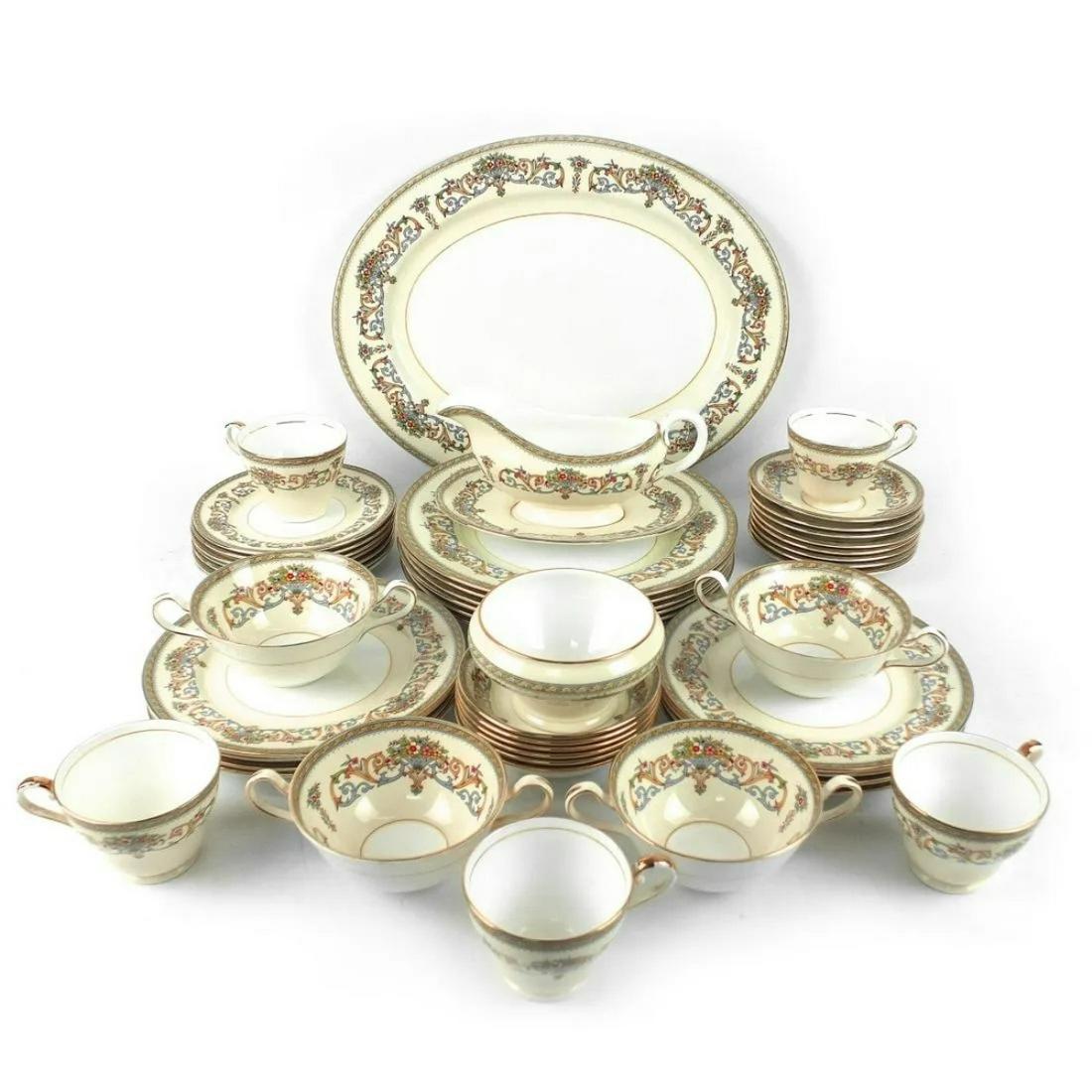 Aynsley Porcelain Dinner Service: Forty Nine (49) Piece Aynsley "Henley" Porcelain Dinner Service. Includes: (6) dinner plates measuring 10-1/2", (8) desert plates measuring 8-3/8", (7) bread and butter plates, (5) footed cups, (4) cr