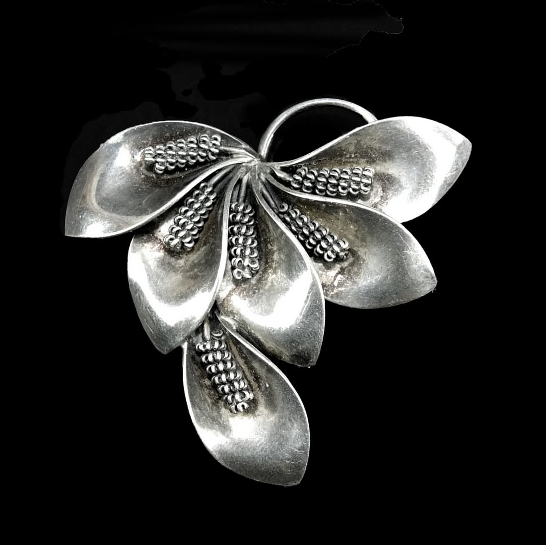 Vintage Aarre & Krogh Denmark Sterling Brooch: Vintage Aarre & Krogh Denmark Sterling Silver Lily Pin Brooch. Stamped A&K Denmark sterling on the base. Measures 1-1/2" x 1-7/8". Approx. weight: 0.38 troy ounces. Condition: Good condition. Estimate