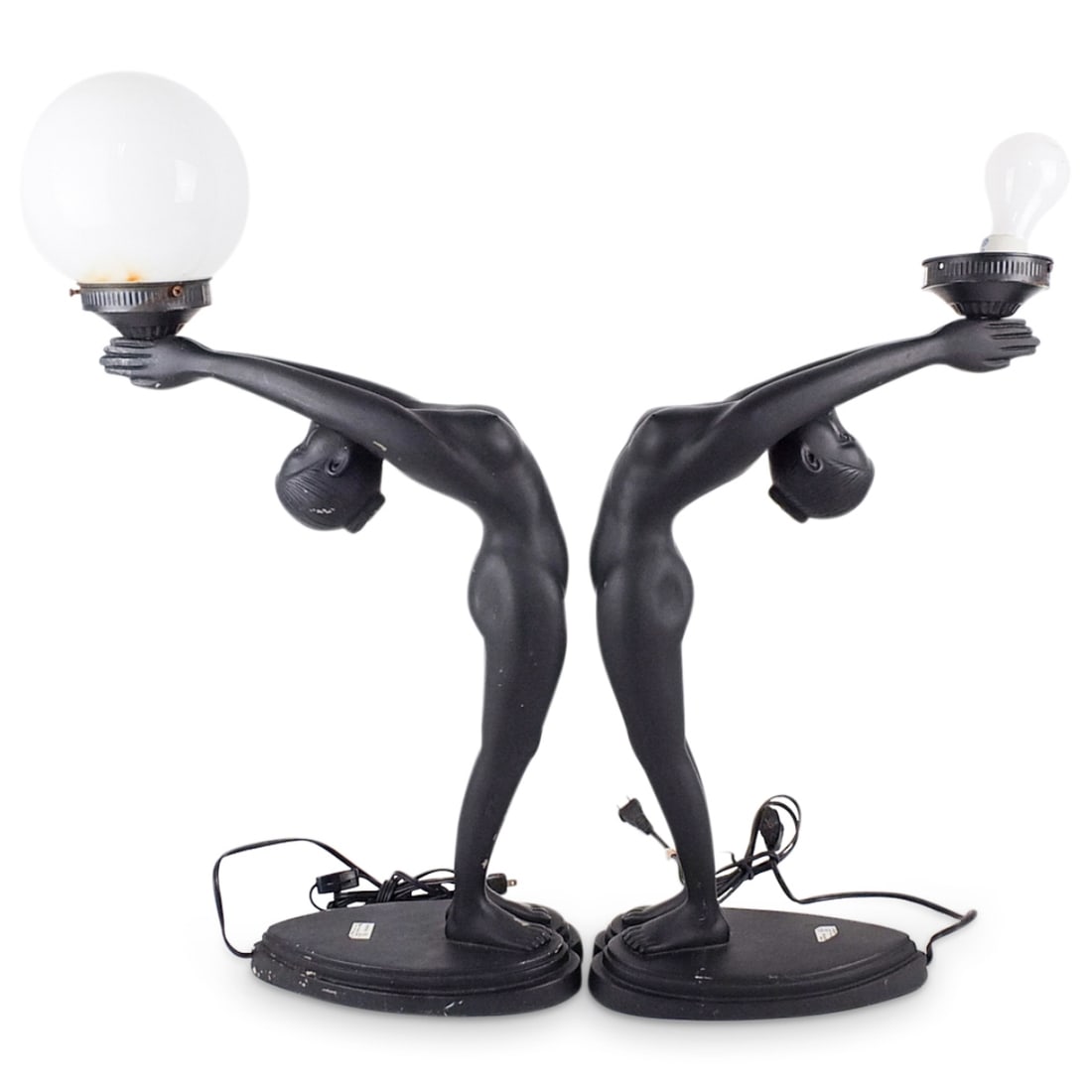 Pair of Art Deco Nude Figural lamps: Pair of Art Deco Nude Figural lamps. Underwrites label attached to the surface. Measures: 20" x 5" x 13-1/2". Condition: Both lamps have scuffs and scratches to the surface. One is missing a shade. Es