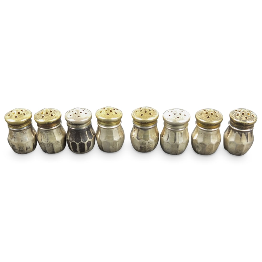 Eight Vintage Watrous Sterling Salt / Pepper Shake: Set of Eight Vintage Watrous Sterling Silver Salt / Pepper Shakers. Stamped. Measures 1-1/2" x 1". Approx. weight: 1.607 troy ounces. Condition: Good condition. Estimate 100.00 - 200.00 Domestic shipp
