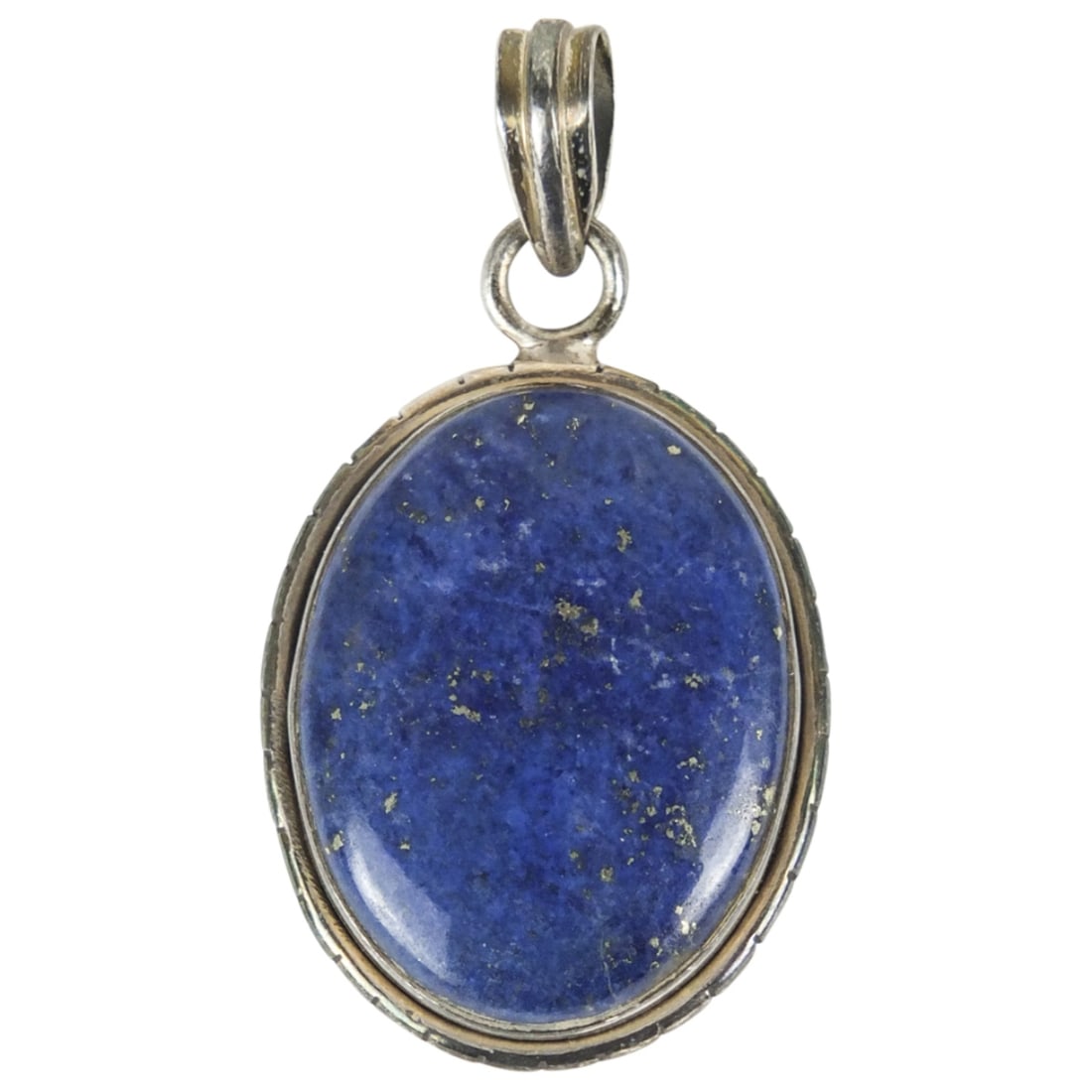 Vintage Sterling Silver and Lapis Lazuli Pendant: Vintage Sterling Silver and Lapis Lazuli Pendant. Stamped. Measures 1-1/2" x 1". Approx. weight: 12 grams. Condition: Good condition. Estimate 50 - 150 Domestic shipping Third party