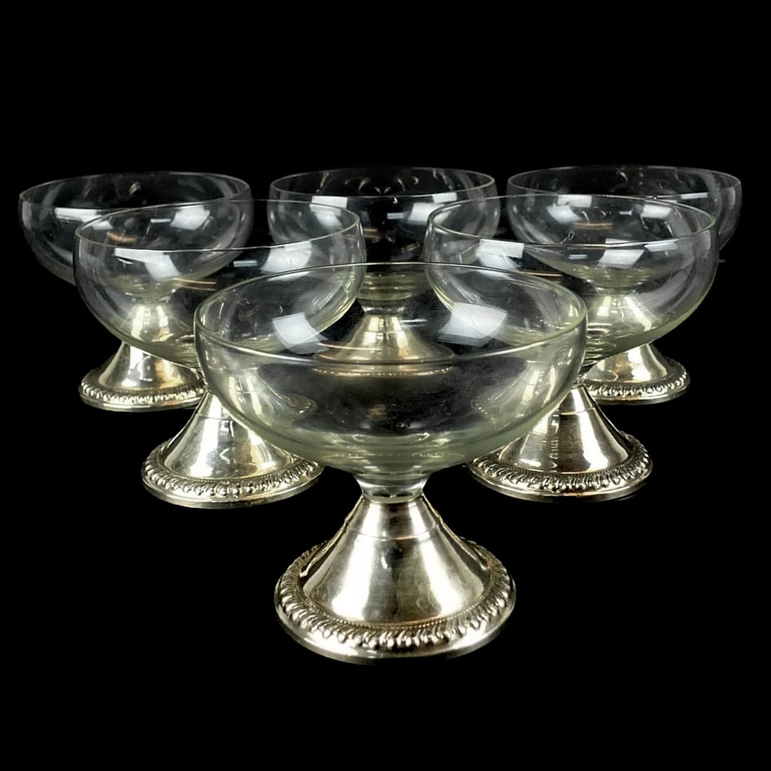 Duchin Creation Cocktail Glasses: Set of Six Duchin Creation Weighted Sterling Silver and Glass Footed Cocktail Glasses. Stamped. Measures 3-1/8" x 3-5/8". Condition: Good condition. Estimate 60.00 - 120.00 Domestic shipping Third par