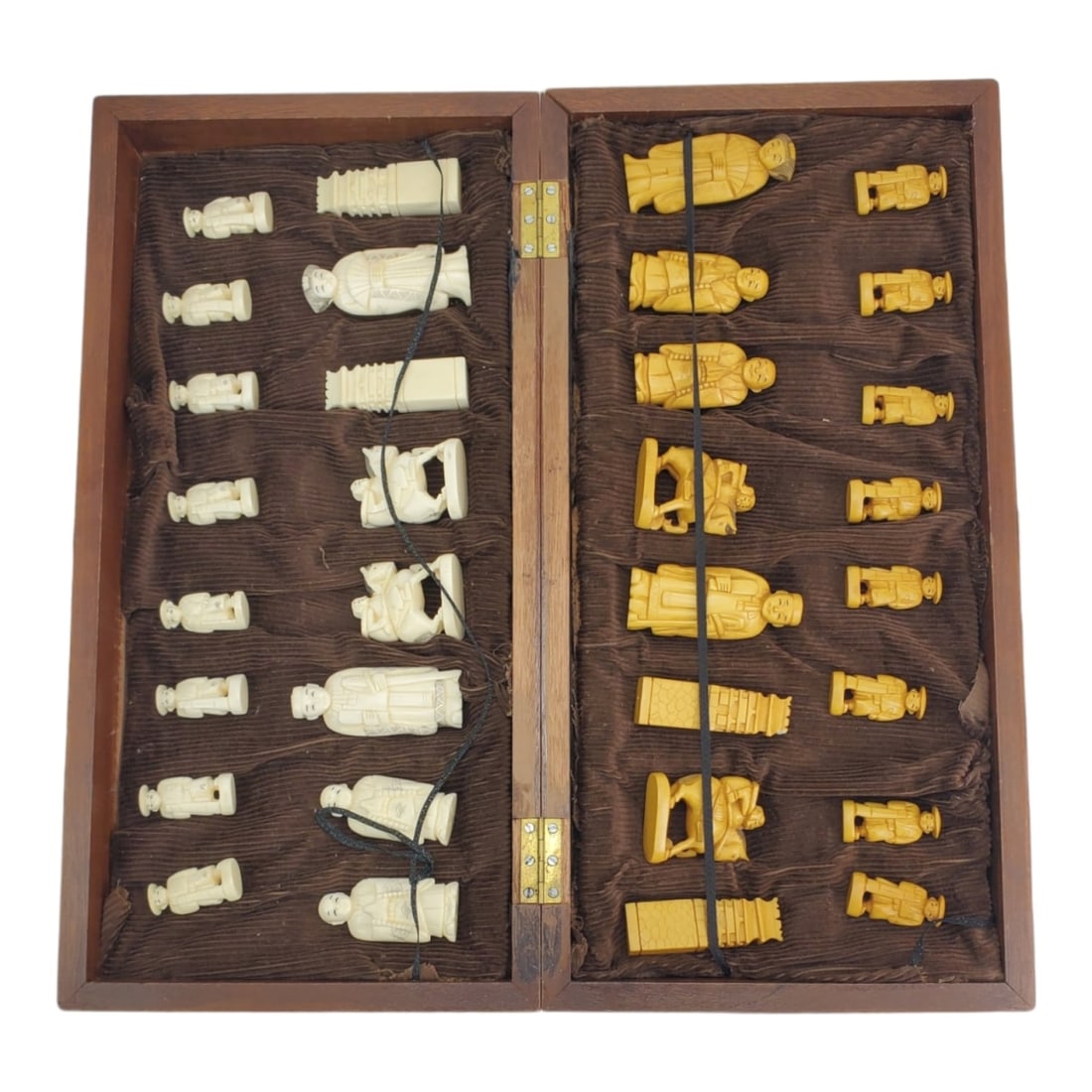Antique Japanese Carved Chess Set: Antique Japanese Polychrome and Tea Stained Bone Carved Chess Set to Include 32 Game Pieces along with a Wooden Game Board. Tallest measures 3" x 1-1/4". Game board measures 4-1/4" x 8-1/4" x 16-1/2".