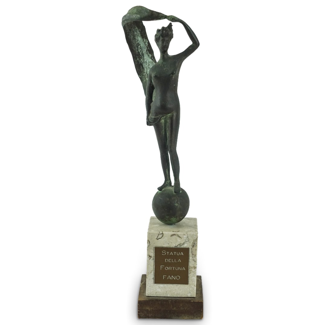 Neoclassical Style Bronze Sculpture: Vintage Neoclassical Style Bronze Sculpture of Lady Fortune. Presented on a stoneware base. Measures 14" x 3" x 3". Condition: Rubbing and oxidation to the surface. Estimate 100 - 300 Domestic shippin