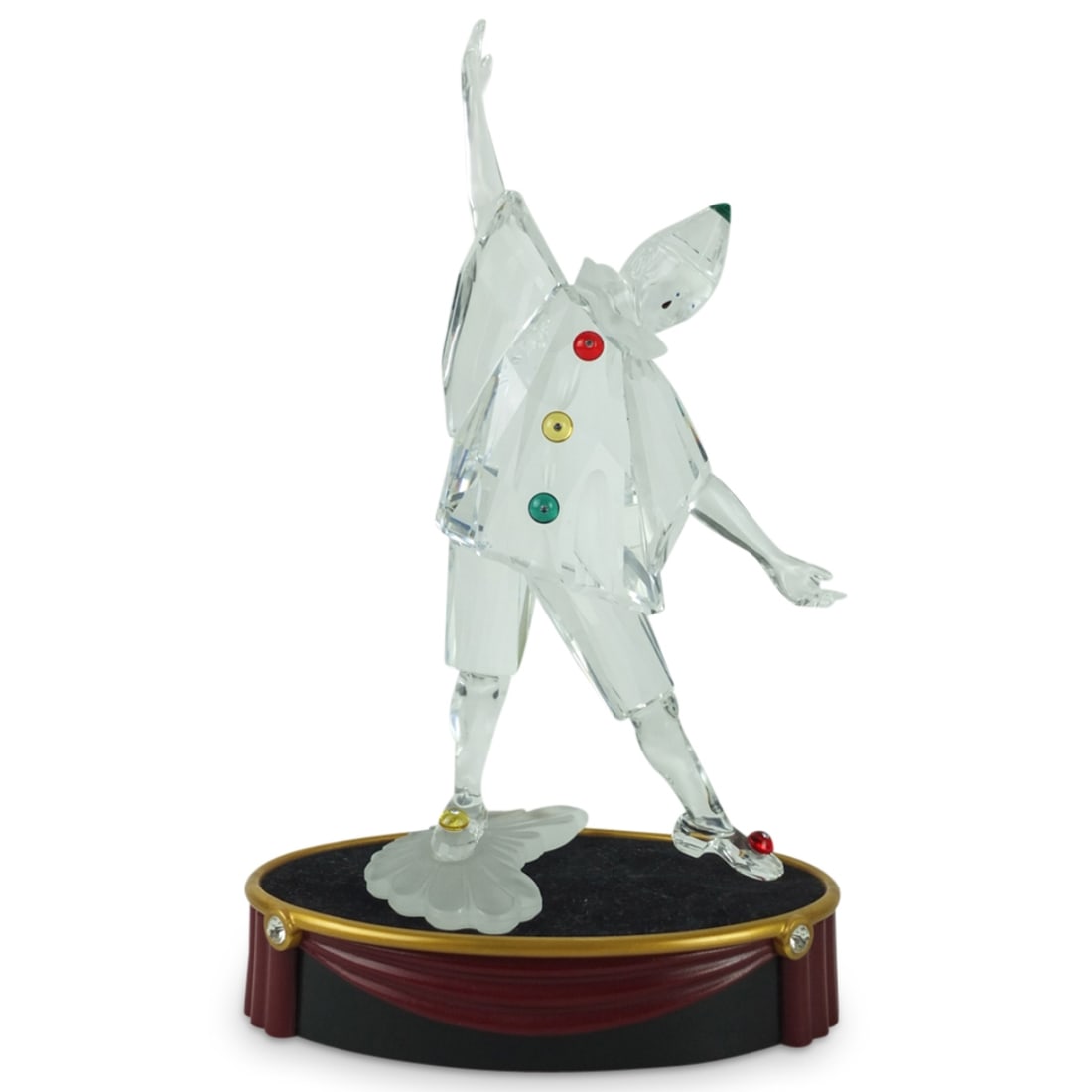 Vintage Swarovski Crystal Figurine: Vintage Swarovski Crystal Pierrot (Masquerade 1999) Figurine Presented on a Platform Stand. Signed. Figurine measures 8-1/8" x 4-1/4". Condition: Good condition. Estimate 50 - 150 Domestic shipping Th