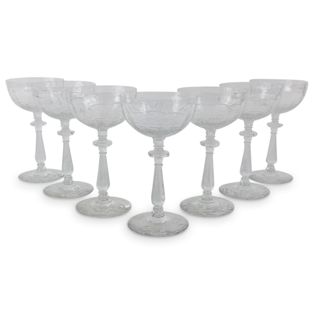 vintage Rock Sharpe etched white wine glasses: Set of seven vintage Rock Sharpe etched glass white wine glasses. unsigned. measures: 5-1/2" x 3-1/8". Condition: one glass as a very very tiny chip to the rim. Estimate 20 - 120 Domestic shipping Thi