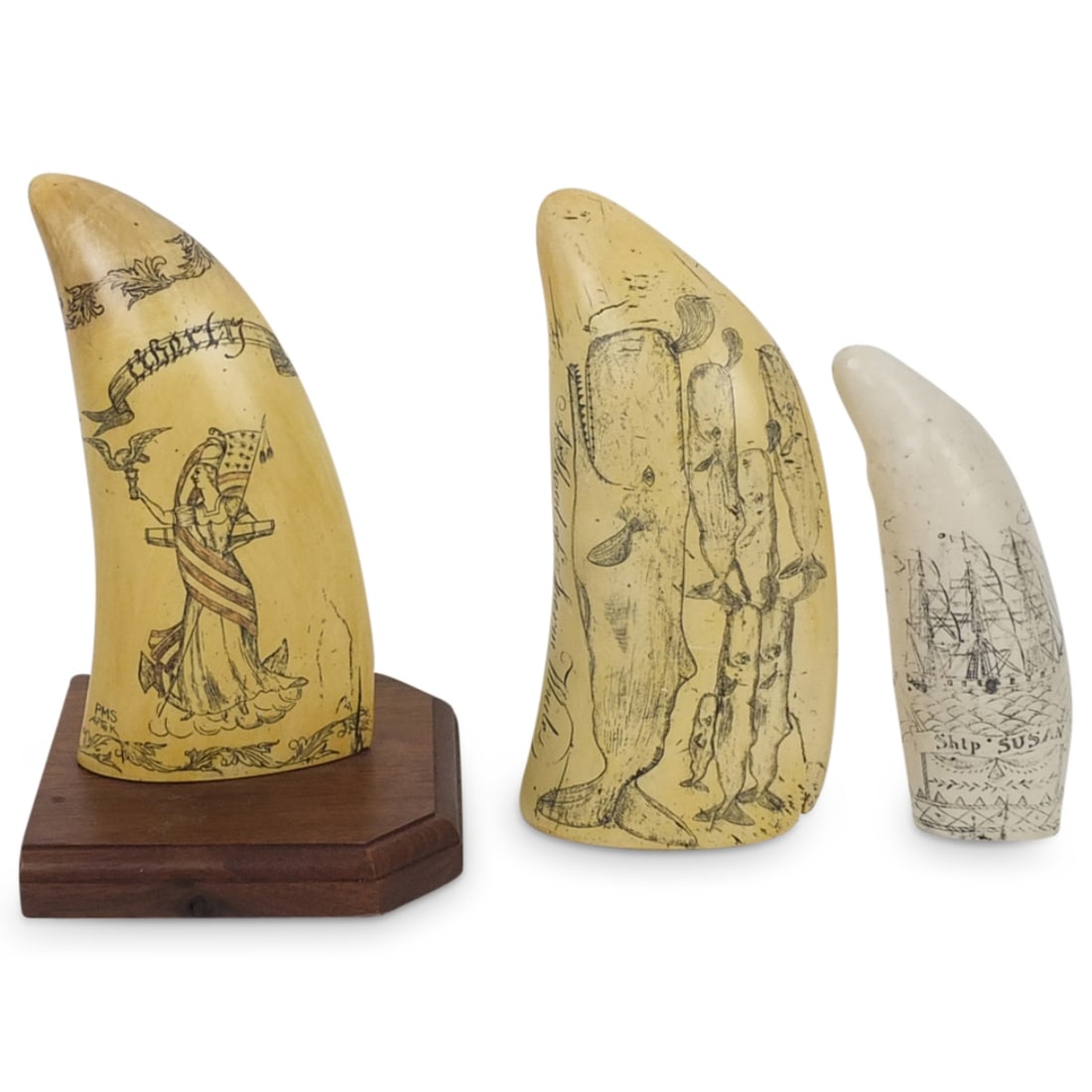 Grouping of Reproduction Scrimshaw Whales Tooth: Grouping of Three Reproduction Etched Scrimshaw Whales Tooth. Two are by Art Artek. Largest Measures 7" x 3-1/2". Smallest measures 5-1/2" x 1-3/4". Condition: One has small damage to the corner. Othe