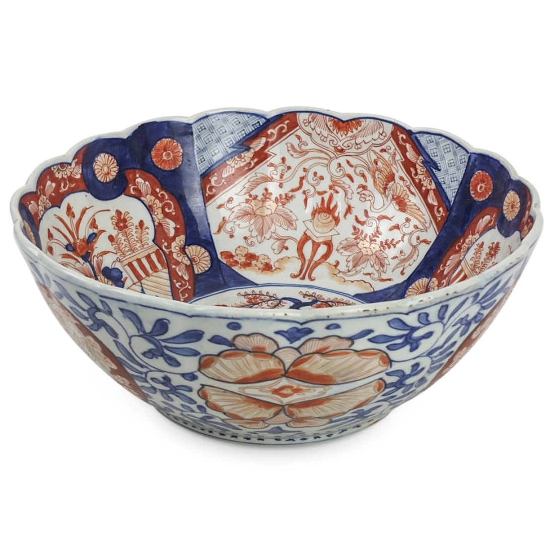 Large Antique Japanese Imari Bowl: Large Antique Japanese Imari Porcelain Bowl. Measures 5" x 12-1/4". Condition: Good condition. Estimate 100 - 300 Domestic shipping Third party