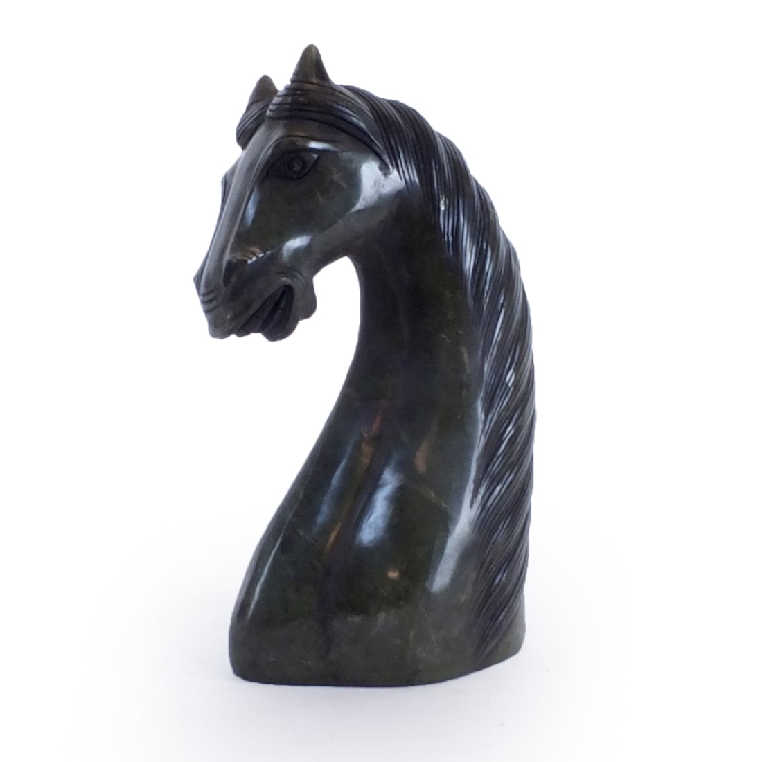 Jade Carved Horse: A Vintage Jade Carved Bust of a Horse Sculpture. Measures 8" x 2-3/4" x 5". Condition: Good condition. Estimate $60.00 - $120.00 Domestic shipping Third party