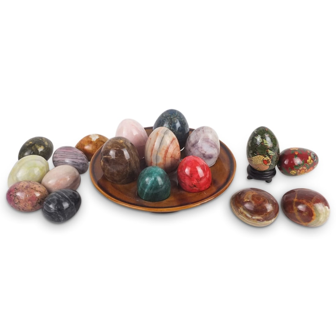 Grouping of Vintage Assorted Eggs: Grouping of Vintage Assorted Eggs with Associated Porcelain Stand. Two are lacquered others are semi-precious stone. Largest egg measures 3" x 2-1/4". Stand measures 2" x 8-1/4". Condition: Good Condi