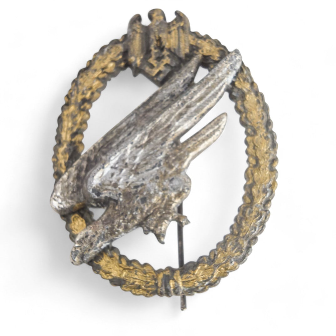 German WWII Luftwaffe Pilot Badge: German WWII Third Reich Luftwaffe Pilot Badge. Marked C.E.Juncker Berlin SW on the reverse side. Measures 2-1/4" x 1-5/8". Please note; this item has not been authenticated by a third-party expert. Th