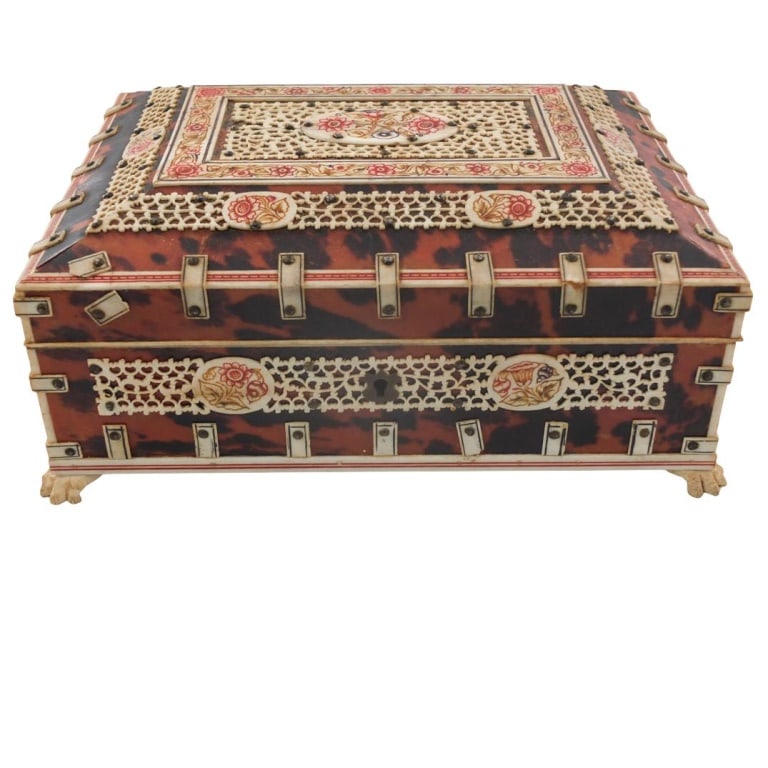 Antique Anglo-Indian Dresser Box: Antique Anglo-Indian Faux Tortoise Shell Lacquer and Bone Inlaid Dresser Box. Measures 3-3/4" x 8-1/2" x 6-3/8". Condition: No key. Small wear to a few bone mountings. Estimate 150 - 350 Domestic ship