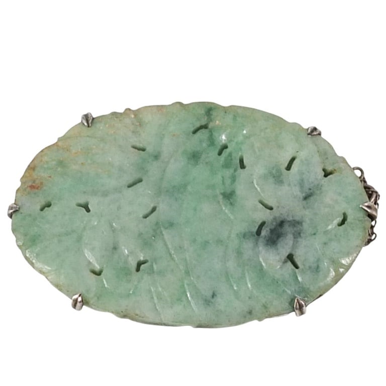Antique Chinese Carved Jade Pendant: Antique Chinese Carved Apple Green Jade Pendant Presented in Sterling Silver Mount. Stamped. Measures 1-3/8" x 2". Condition: Good condition. Estimate 100 - 300 Domestic shipping Third party