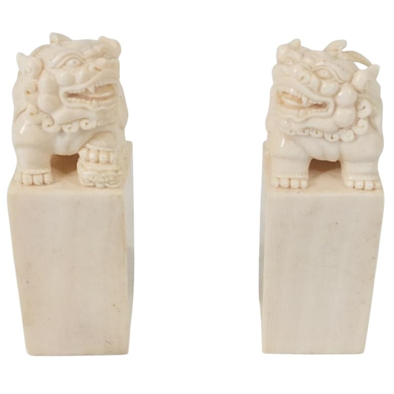 Pair of Chinese Carved Seal Stamps: Pair of Chinese Carved Seal Stamps with Foo Dog Finial. measures 2-1/2" x 1-7/8". Please note; this lot contains material which may be subject to state or import/export restrictions. Condition: Good C