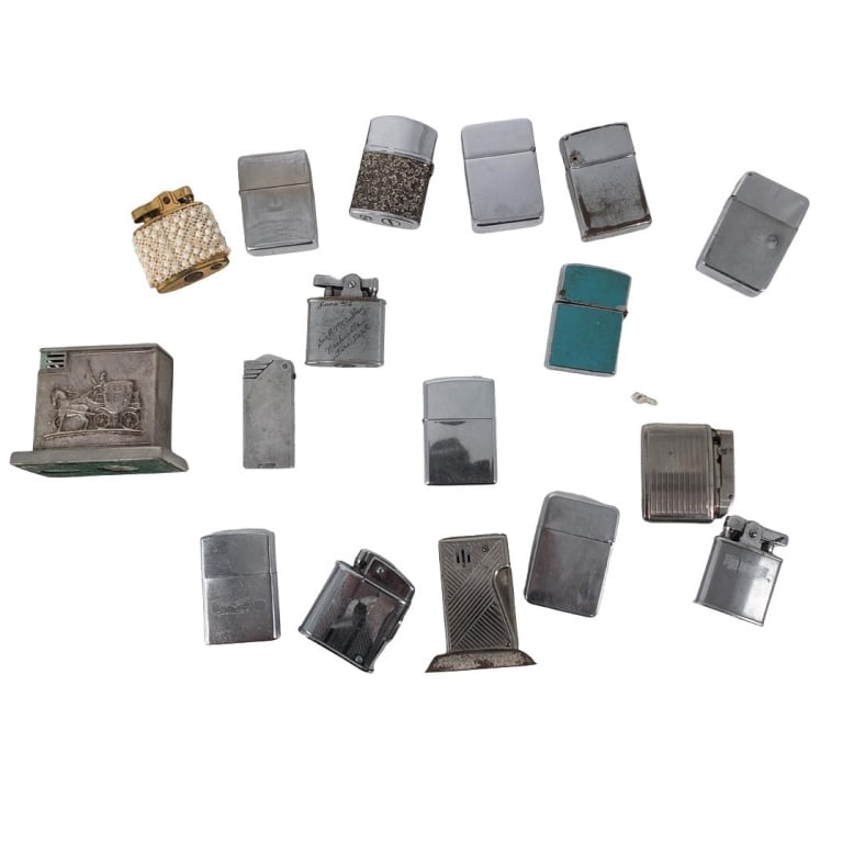 Grouping of Lighters: Grouping of Assorted Lighters. Makers include Clinton, Penguin, Ronson and Consul. Largest measures 2-7/8" x 3". Condition: As is condition. Estimate 20 - 60 Domestic shipping Third Party