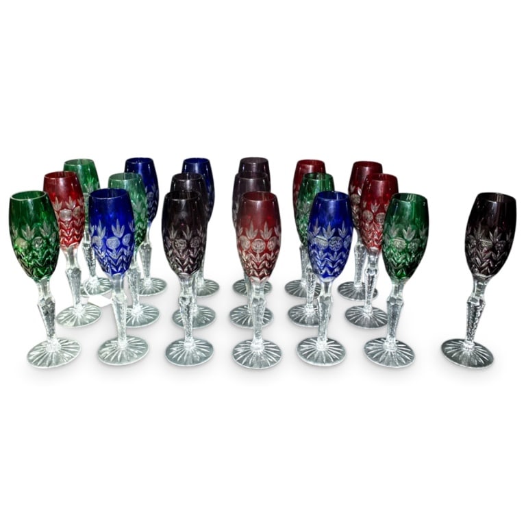 Set of Vintage Bohemian Champagne Flutes: Set of 19 Vintage Bohemian Cut to Clear Crystal Champagne Flutes. Unsigned. Measures 9-1/4" Tall, 1-3/4" diameter Top. Condition: Good Condition Estimate 200 - 400 Domestic shipping Third Party
