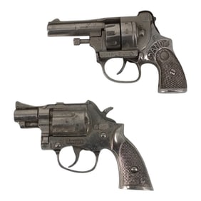 Grouping of Two Toy Guns