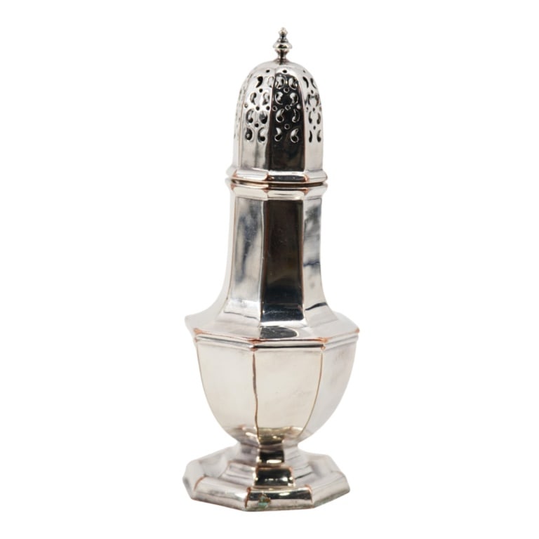 Antique Silver on Copper Sugar Shaker/Muffineer: Antique Silver on Copper Sugar Shaker/Muffineer. Octagonal shaped with reticulated lid. Stamped "Silver On Copper". Measur5es 8" H, Condition: Light wear/blush or in overall good condition consistent