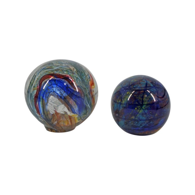 2 Vintage Art Glass Paperweights: 2 Vintage Art Glass Paperweights. Includes a Hand-Crafted UG Collectible 3-1/2" with original label. The other is unsigned and measures 4". Condition: No chips or cracks in good overall condition. Est
