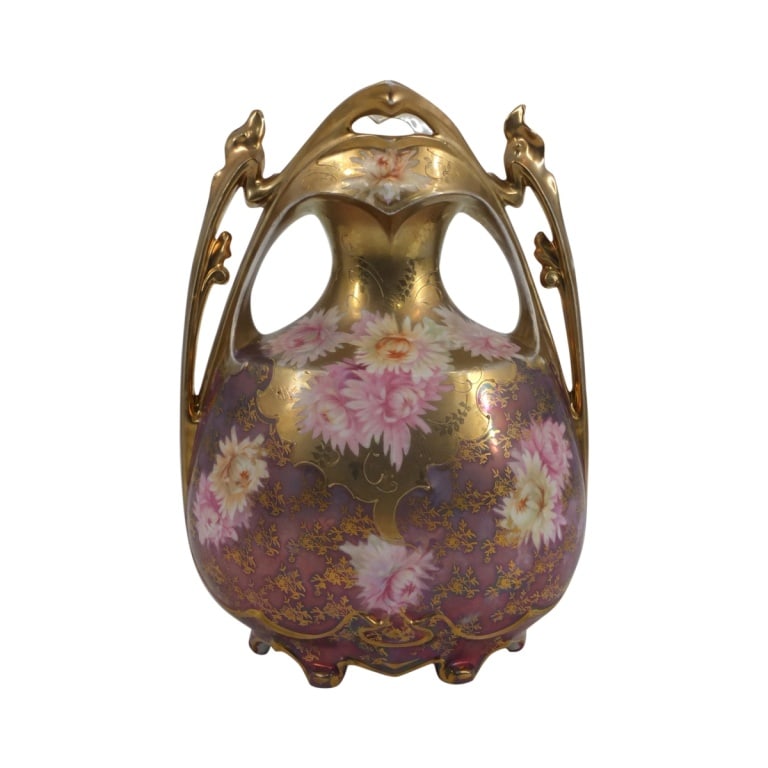 Royal Vienna Porcelain Vase: Royal Vienna gilded porcelain vase with handles. Marked on the base. Measures 9-1/2" x 6-1/2". Condition: Normal rubbing to the gilding otherwise good condition. Estimate 100 - 300 Domestic shipping T