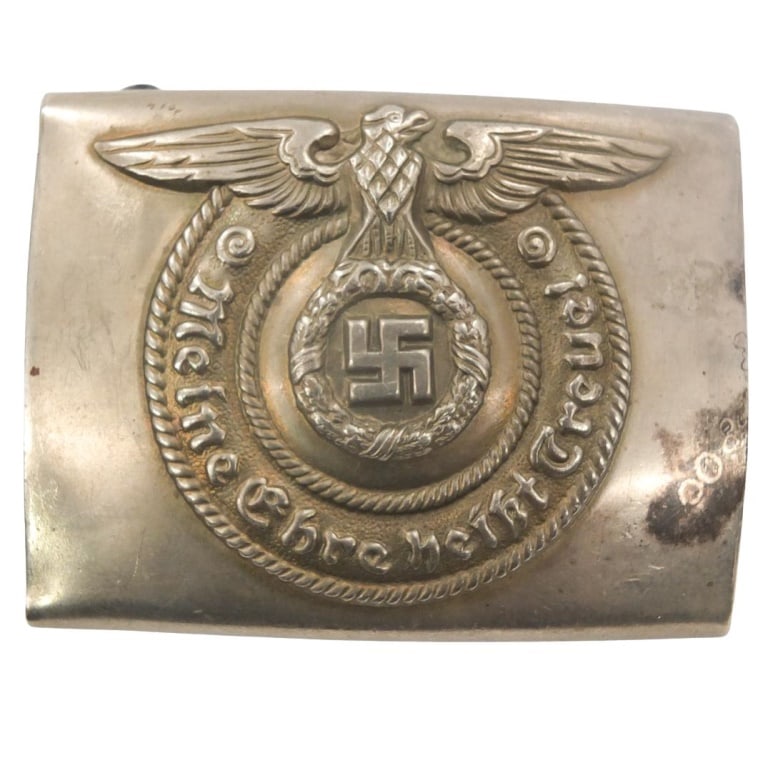 German WWII Belt Buckle: German WWII Waffen SS EM Belt Buckle. Marked O 7 C Ges Gesch" on the reverse side. Markings read Meine Ehre Heist Treue!" (My Honor is Loyalty!). Measures 2-1/2" x 1-7/8". Please be advised: This item
