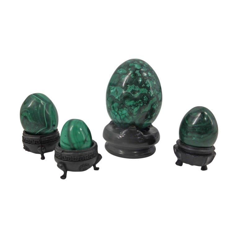 4 Malachite Specimen Eggs: 4 Malachite Specimen Eggs. Various sizes ranging from 1-1/4" - 3'. Total weight approximately 728 grams. Condition: Good condition consistent with age. Estimate 100 - 200 Domestic shipping Third Party