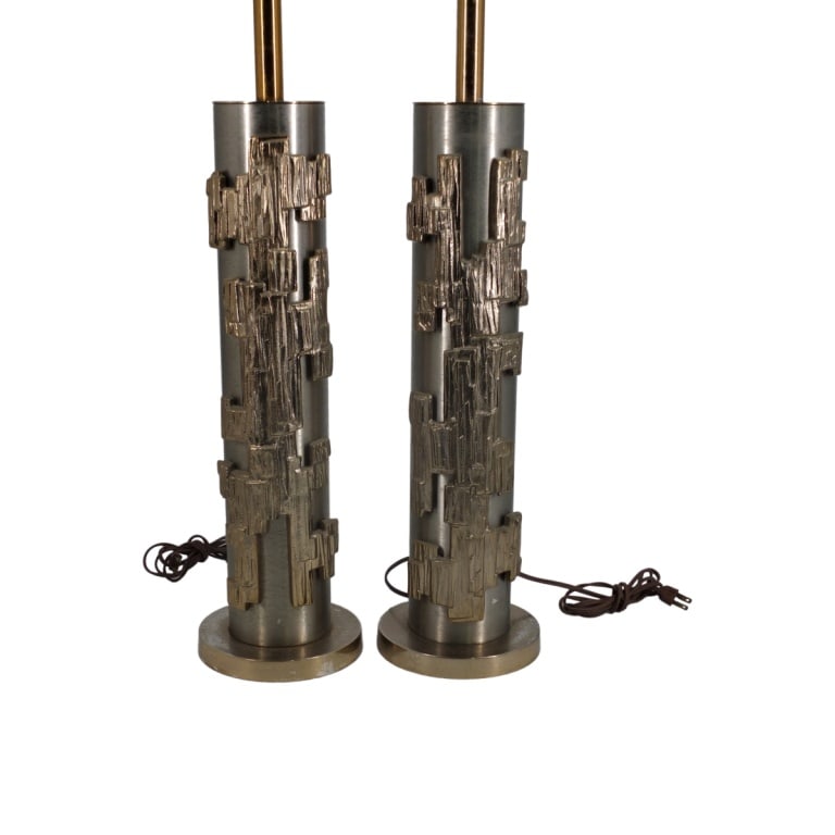 Pair of Laurel Lamp Mfg. Co. Lamps: Pair of mid century modern Laurel Lamp Mfg. Co. lamps. Brass and stainless steel. in the manner of Maurizio Tempestini. Measures 42" x 6-1/2" (WITH HARP). Condition: No shades. Pitting and oxidation t