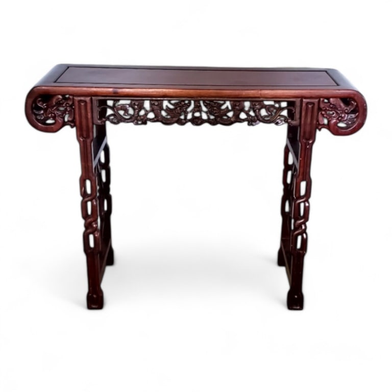 Large Chinese Altar / Console Table: Large Chinese Rosewood Carved Altar / Console Table. Measures 46" x 49-1/2" x 15-3/4". Condition: Scuffs to the top and some scratches to the legs. Estimate 150 - 350 Domestic shipping Third party