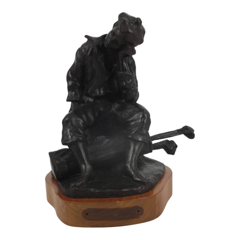 Vintage Bronze Sculpture "Resting Golfer": Vintage Bronze Sculpture "Resting Golfer" on Wood Base. Unsigned. Measures 10-1/2" H x 8" x 8". Condition: Good condition. Estimate 100 - 300 Domestic shipping Third Party