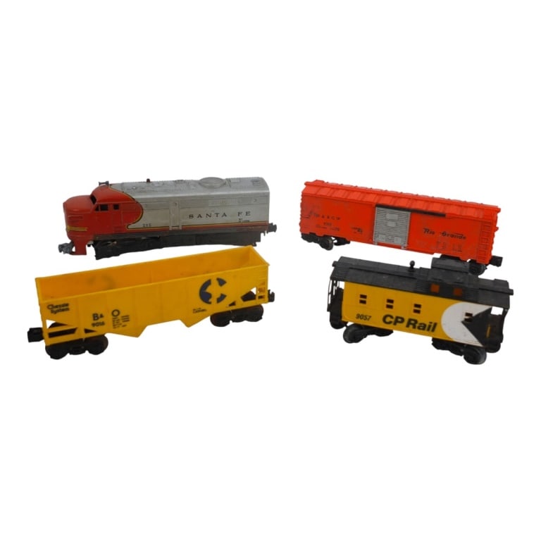 4 Vintage Lionel Electric Train Cars: 4 Vintage Lionel Train Cars. Includes: Santa Fe Alco Diesel Locomotive #215 Denver & Rio Grande Western Box Car #6-9705 B & O Chessie System 2-Bay Hopper car #9016 CP Rail Bay Window Caboose #9057 Eng