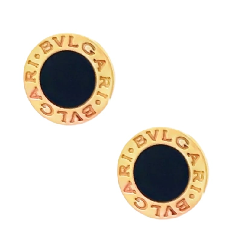 Pair of Bulgari 18K Rose Gold & Onyx Earrings: Pair of Bulgari 18 karat rose gold and black Onyx stud earrings. Stamped. Measures: 10 mm Approx. weight: 4.9 grams. Condition: Good condition. Estimate 800 - 1200 Domestic shipping Third party