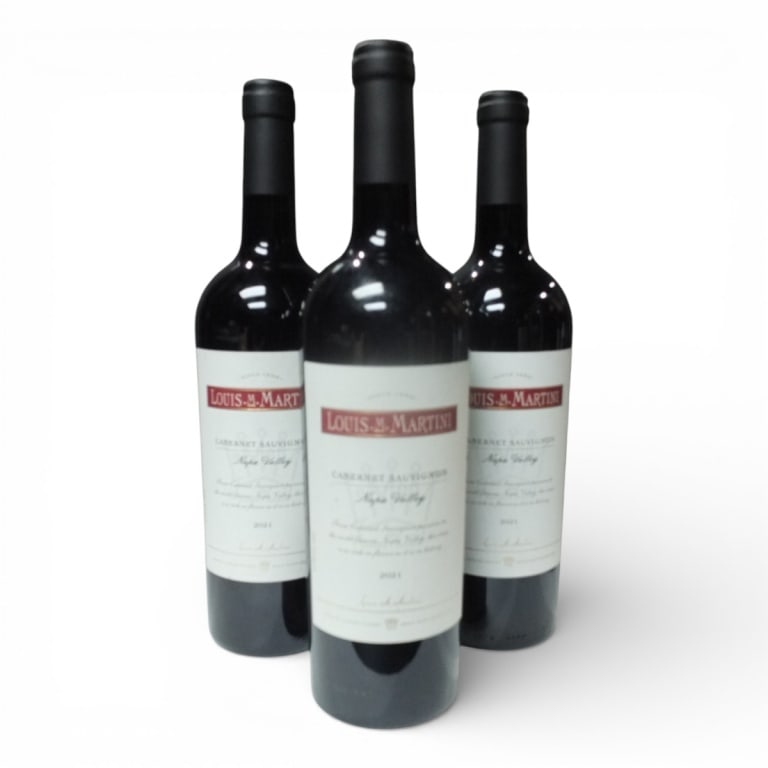 (3) Louis M Martini 2021 Cabernet Sauvignon: (3) Louis M Martini 2021 Napa Valley Cabernet Sauvignon, 750ml Bottles. Offered from a South Florida Private Collection. Bidders are purchasing the bottle and its historically significant, unbroken ta