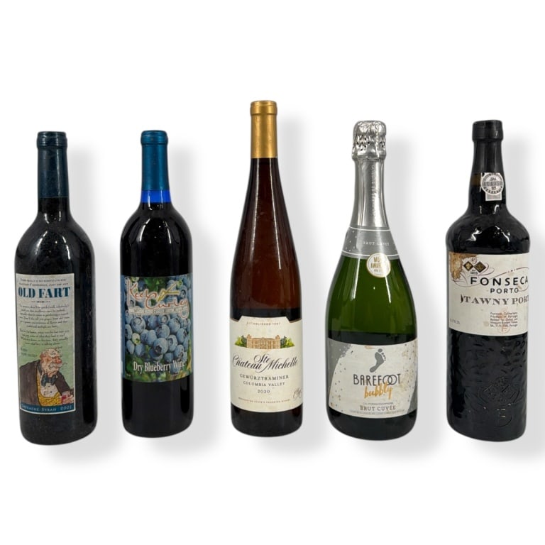 5 Vintage Wine Bottles: 5 Vintage Wine Bottles. Lot includes: Fonseca Tawny Port, Old Fart 2001 Grenache Syrah, Keel Curley Dry Blueberry Wine, Ste Chateau Michelle 2020 Gewurztraminer, Barefoot Brut Cuvee. 750ml bottles. Of